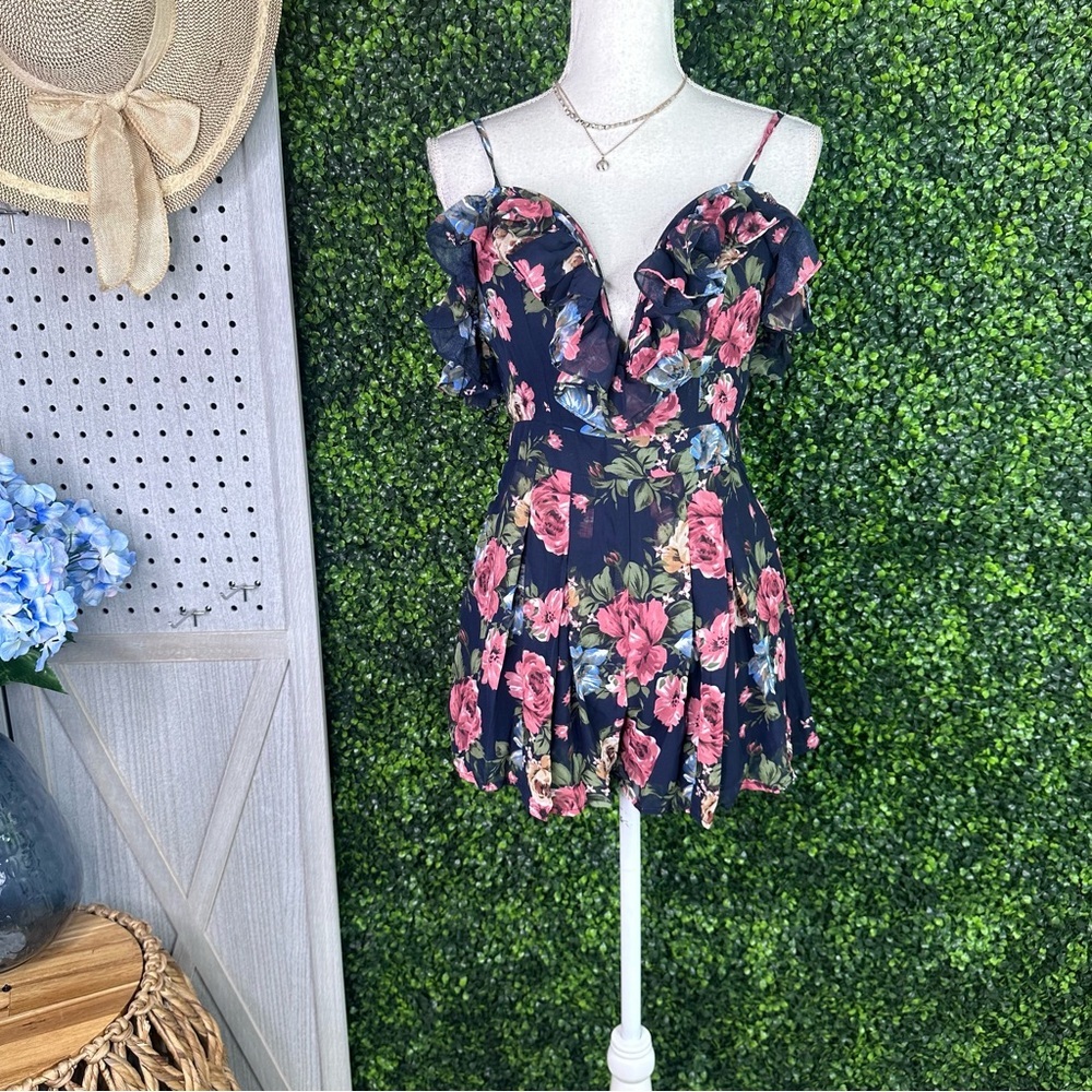 Nwt whimsical Floral V cut Ruffled romper nwt